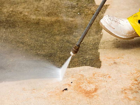 Driveway washing in humid climates stopping slippery concrete before it starts